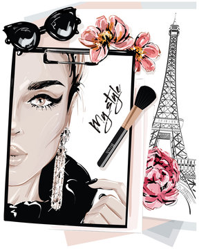 Hand drawn stylish table set with notes, sketches, makeup brush, sunglasses and flowers. Woman face sketch and eiffel tower. Vector illustartion.
