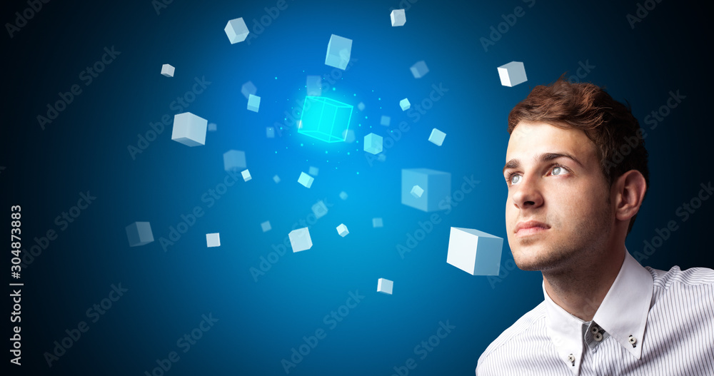 Aufkleber Man touching hologram screen displaying cube symbols