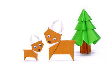 Origami Christmas paper art : Reindeer and Christmas tree, Merry Christmas and Happy New year. Copy space