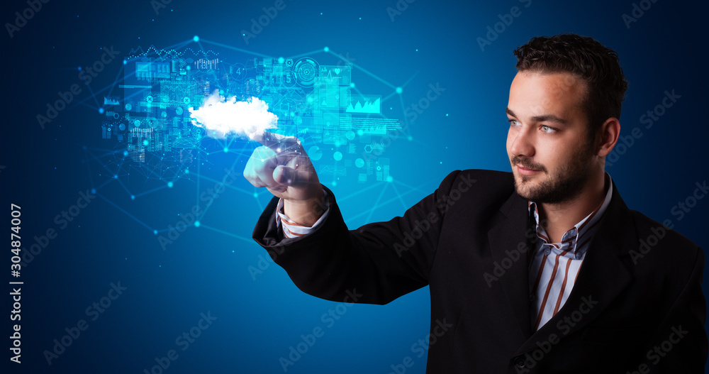Aufkleber Man touching hologram projection displaying information from cloud based system