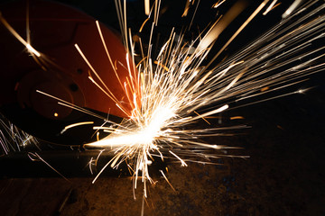 Sparks light Cutting steel Industrial concept in factory