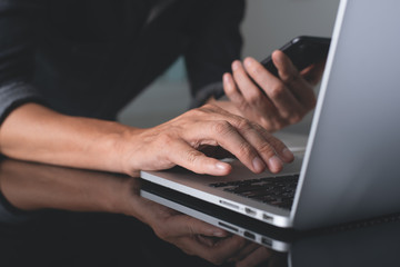 Businessman working on laptop computer