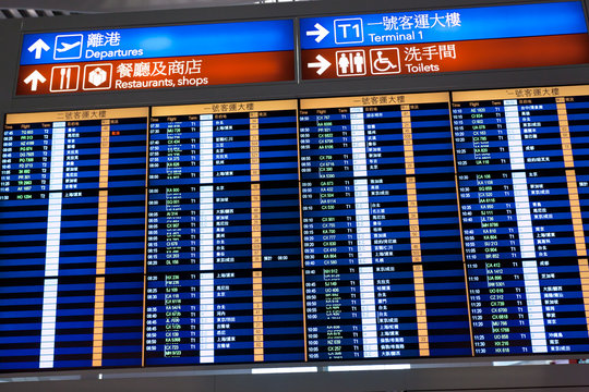 HONG KONG, INTERNATIONAL AIRPORT - 26 OCTOBER 2012: Airport timetable board in airport terminal
