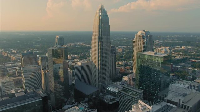 Aerial: downtown Charlotte buildings during the day.  Charlotte, North Carolina, USA.  10 August 2019