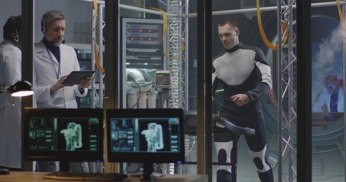 Astronaut walking on treadmill