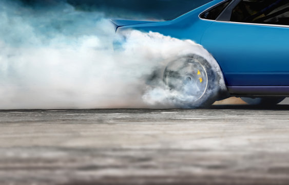 Race drift car burning tires on speed track © toa555