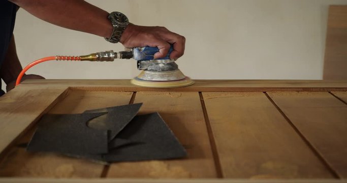 Woodworking. Sanding on wood in 4K resolution