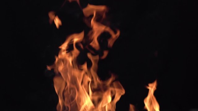 Slow motion shot of fire on a black background to use it as a overlay in every shot.