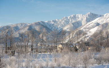 Fototapeta na wymiar House With Winter Mountain VIew