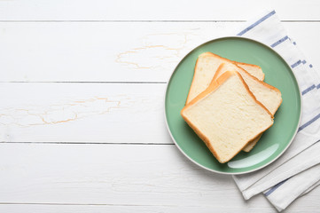 Fresh homemade  baked bread and sliced bread on wooden