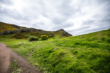 Beautiful scenic landscape of amazing Scotland nature and mountain trail road.