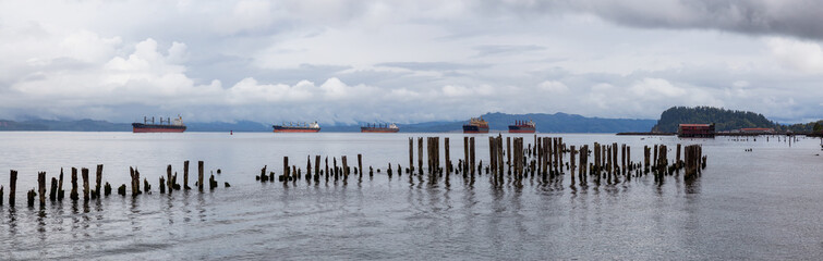 Fototapeta na wymiar Astoria, Oregon, United States. Beautiful Panoramic View of the Columbia River during a cloudy summer morning.