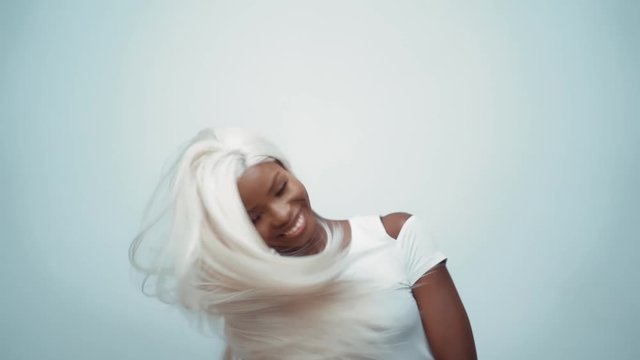 African sexy woman with white hair on white