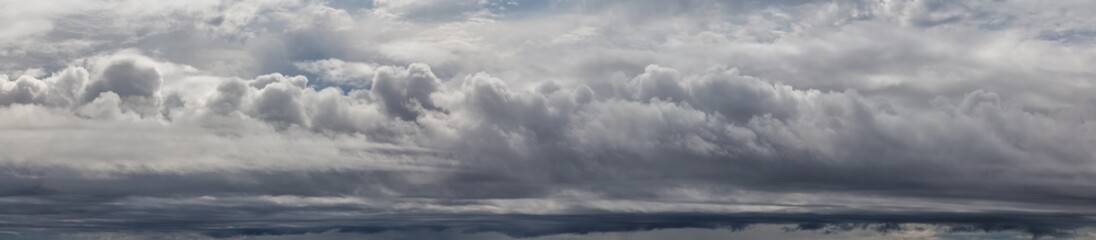 Beautiful Panoramic View of Puffy Cloudscape during a colorful summer day. Taken in Oregon Coast, United States of America.