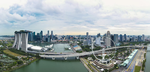 View from above, stunning aerial view of the skyline of Singapore during a dramatic sunset with the...