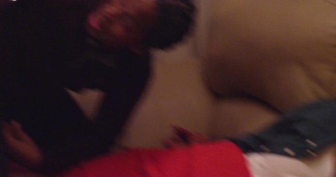 Male films and posts a snapchat story of a passed out drunk man at a holiday party - shot on RED