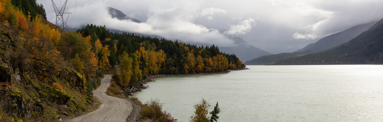 Beautiful Panoramic Landscape View of a Scenic road in Canadian Nature during a Cloudy Autumn Day. Taken at Lillooet Lake, Pemberton, British Columbia, Canada.