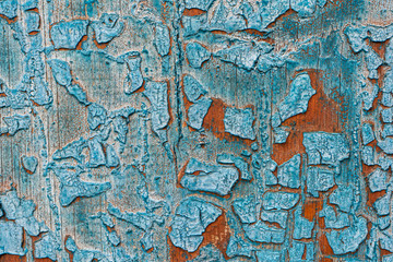 Wooden background with old and dry paint