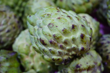 Annona fruit in bulk at a market