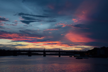 Scenic sunset with bridge silhouette on Paramatta river. Meadowbank, Australia