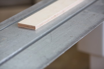 Wooden bars lying in a row closeup background