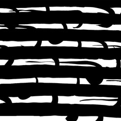 Obraz na płótnie Canvas Grunge brush pattern. Texture. White and black vector.