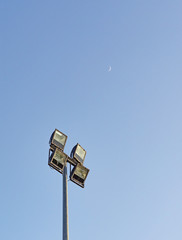 Spotlight for outdoor square shape 4 piece made with steel stick on the pole steel have blue sky...