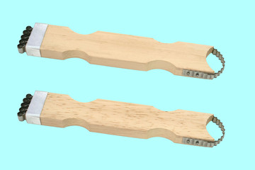 Equipment grated coconut on a blue background, with clipping path