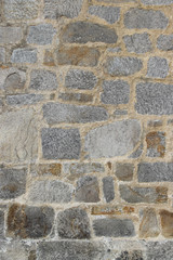 Wall made of natural rocks of different sizes and shapes