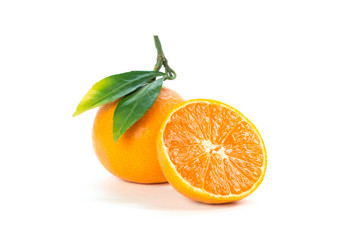 Tangerine with green leaves. Close up. Isolated on white background