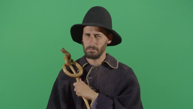 Adult Man Magician Looking Suspicious At Camera