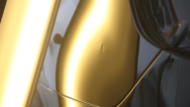 rectification of dents on the metal surface of the car. Metal heating, reflection on the car