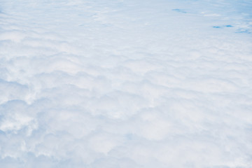Background of View the blue sky and white clouds  from the airplane window with copy space