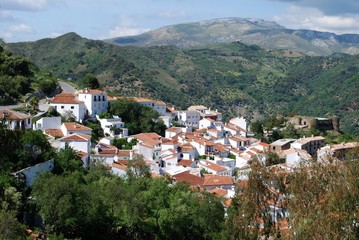 Elevated view of the town and castle in the mountains, Benadalid, Spain.