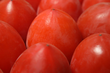 Persimmon close-up. Natural orange background.