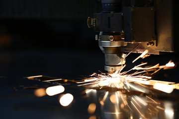 Sparks fly out machine head for metal processing