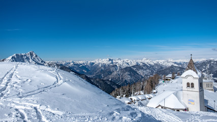 The sanctuary of Lussari in a winter day