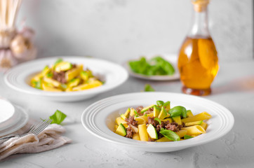 Delicous pasta with beef and fresh avocado
