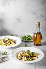 Delicous pasta with beef and fresh avocado