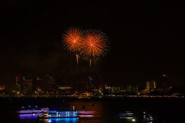 Firework colorful on night city view background for celebration festival.