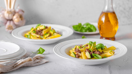 Delicous pasta with beef and fresh avocado