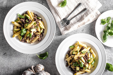 Delicous pasta with beef and fresh avocado