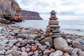 cairns on the seashore. Rocky seashore