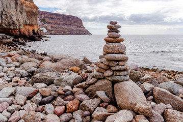 cairns on the seashore. Rocky seashore