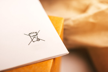 Reusable white paper with zero waste sign.