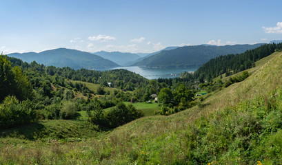 Panoramic view of Eastern Carpathians, Lake Bicaz and Bicaz-Stejaru Hydroelectric Power Station on the background, Romania