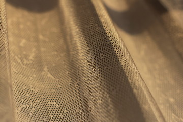 Abstract close-up background - curtain on sunlight.