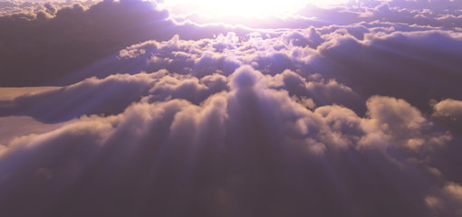 Fototapeta na wymiar above clouds sunset god ray