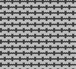 Geometric black and white pattern. Imitation knitting or embroidery. Seamless background. Jacquard.