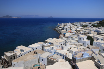 Fototapeta na wymiar travelling after covid 2021 greek nisyros typical landscape blue doors lockdown